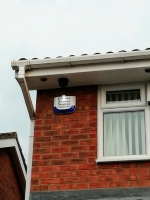 Illuminated bell box on customers house